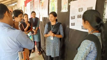 Students of science stream are answering THE JUDGES queries regarding their posters.